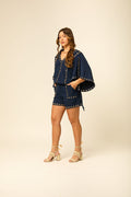 CONJUNTO COM ILHOS SHORTS BLUSA